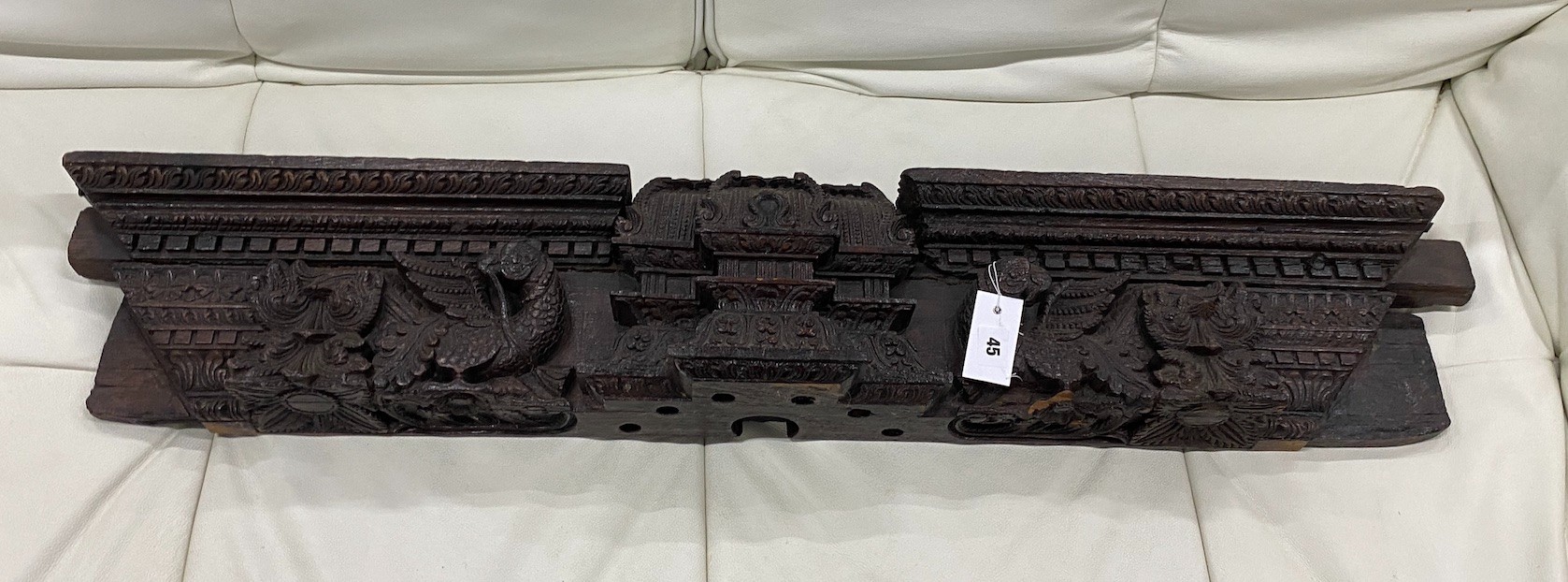 A 19th century Anglo Indian carved pediment, length 112cm, height 19cm